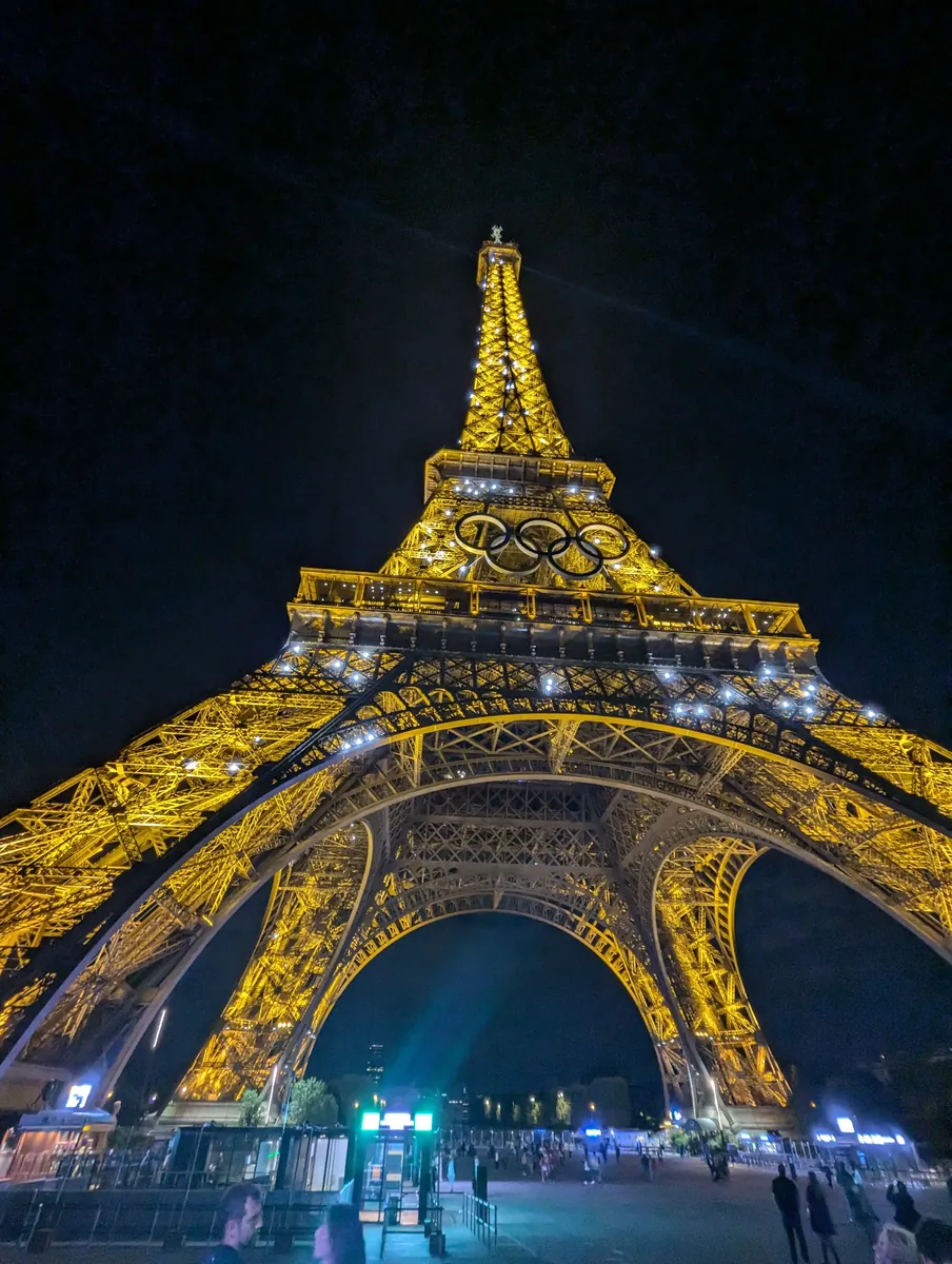 Paris - Eiffel Tower illuminated at night with city skyline