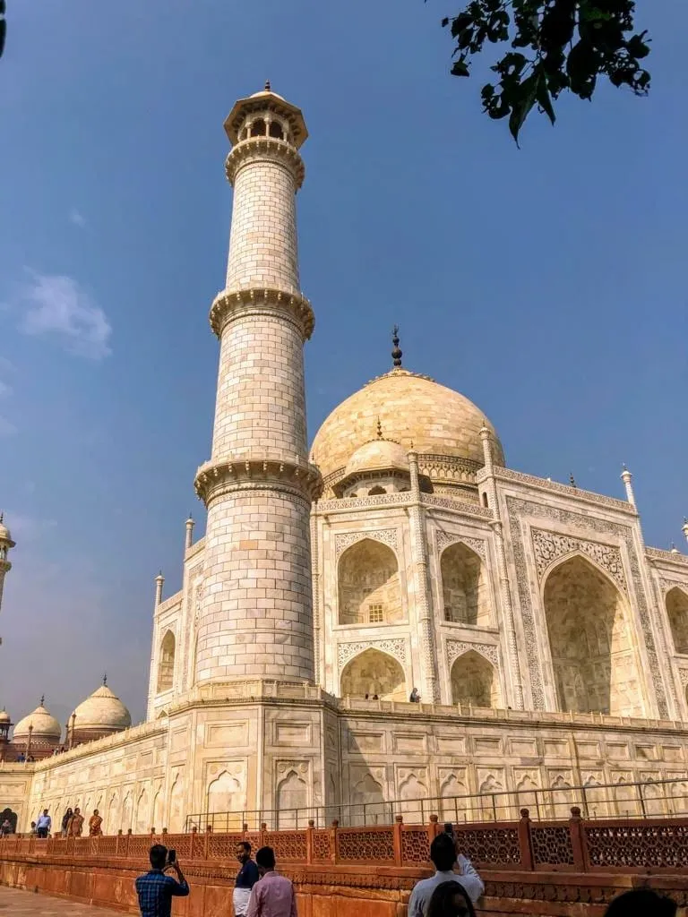 India - Sunrise over the Taj Mahal reflecting pool