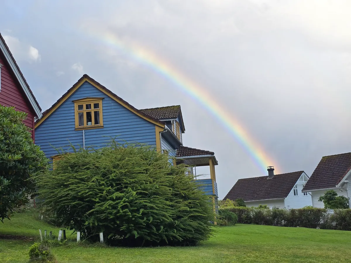 Holiday Ideas - Northern lights above a Norwegian fjord